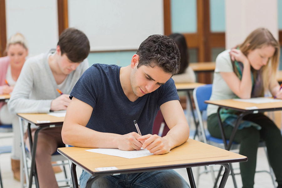 Students taking a test in a classroom in Mesa